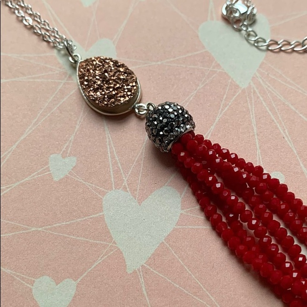 Natural rose gold crystal and tassel necklace by Sparkazilla on Etsy.
